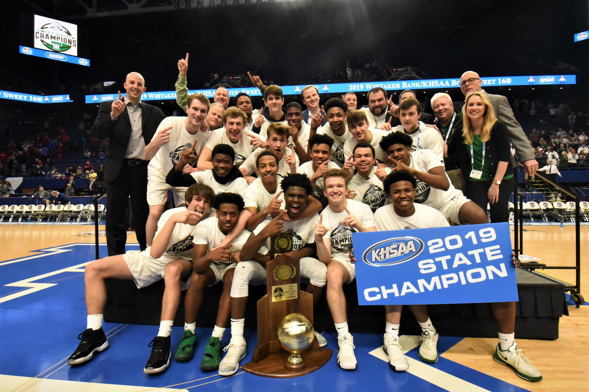2019 state champs - basketball team on the court