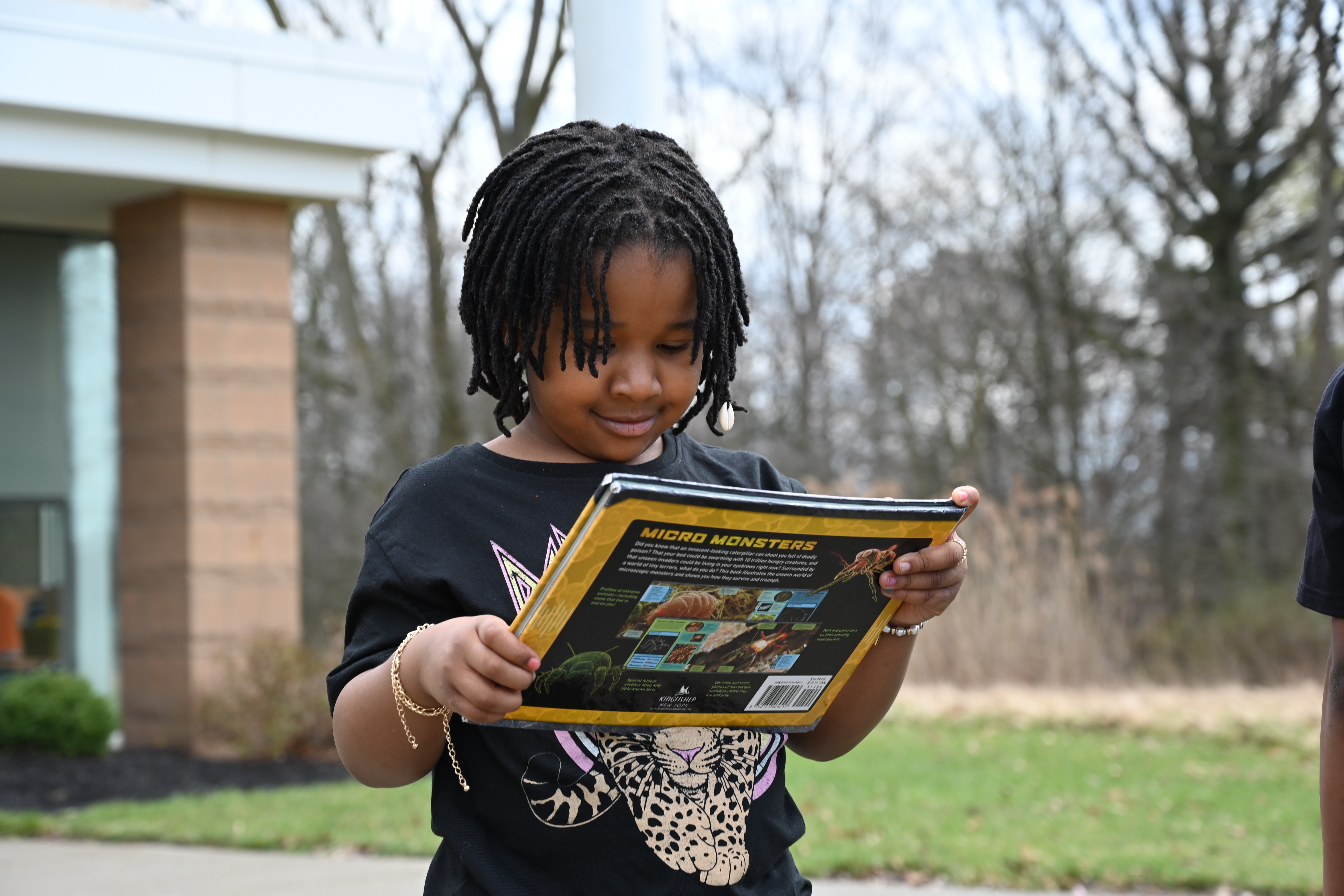 female black student reading 