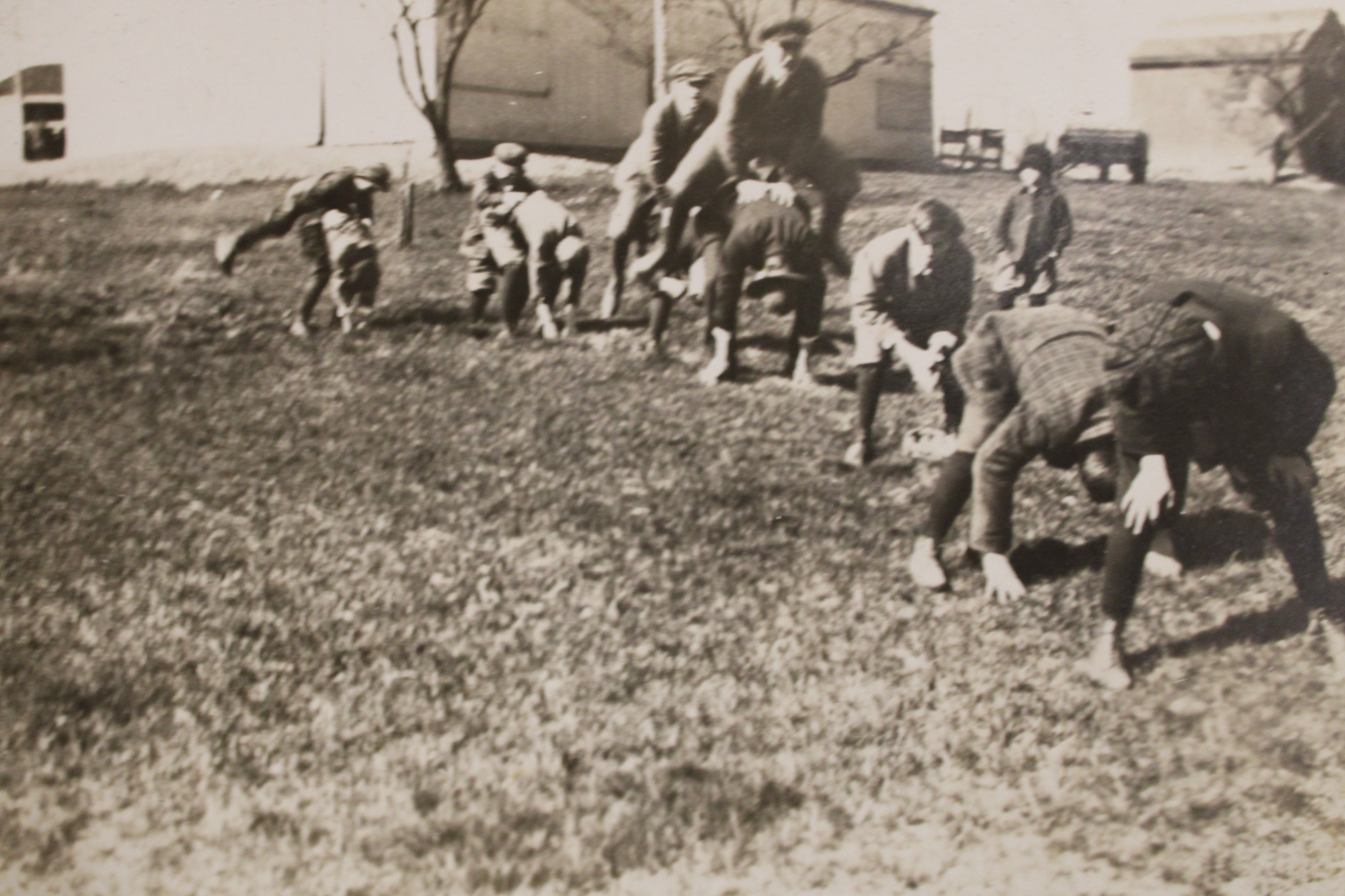 Photo of children playing leap frog. 