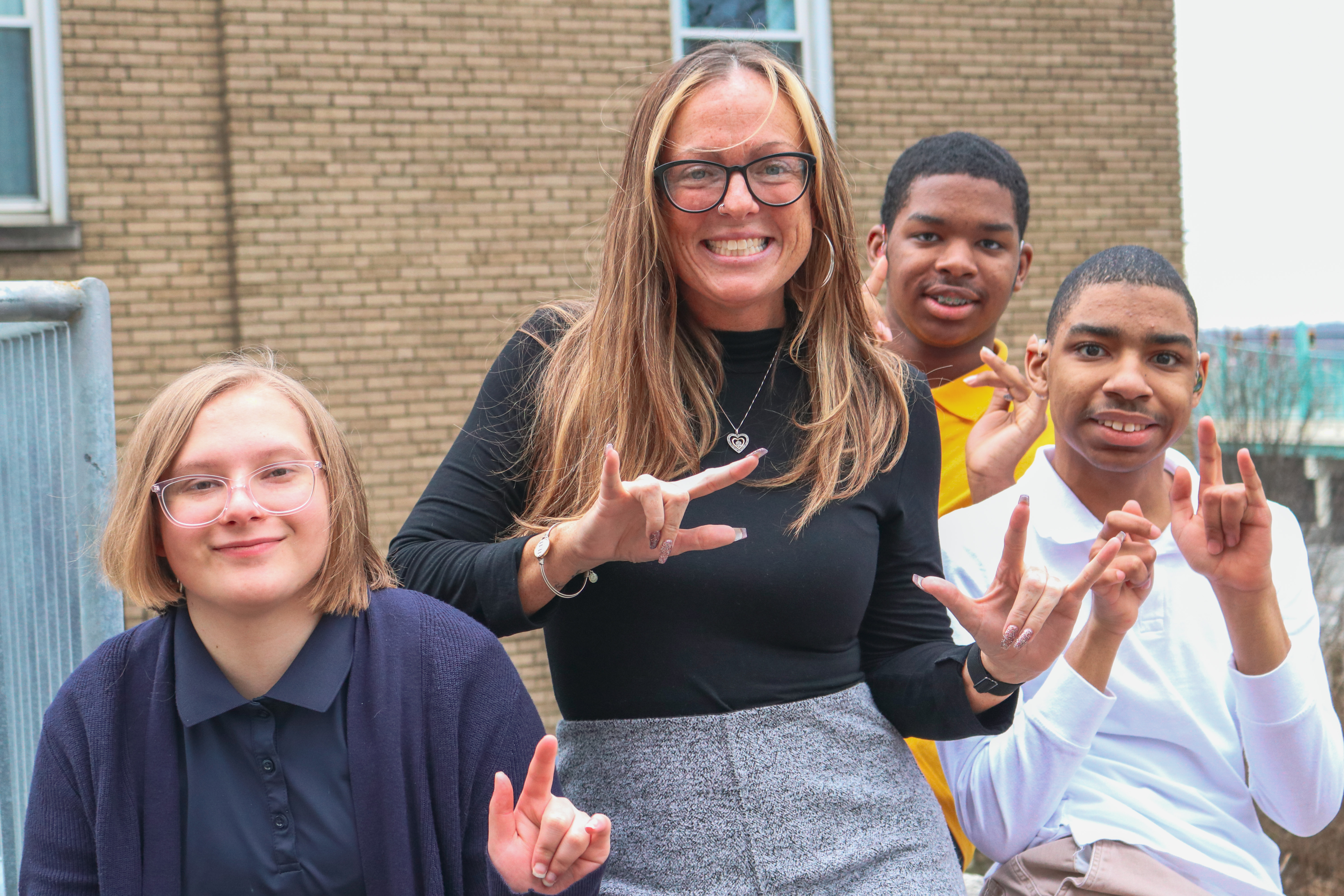 high school group pic with a teacher