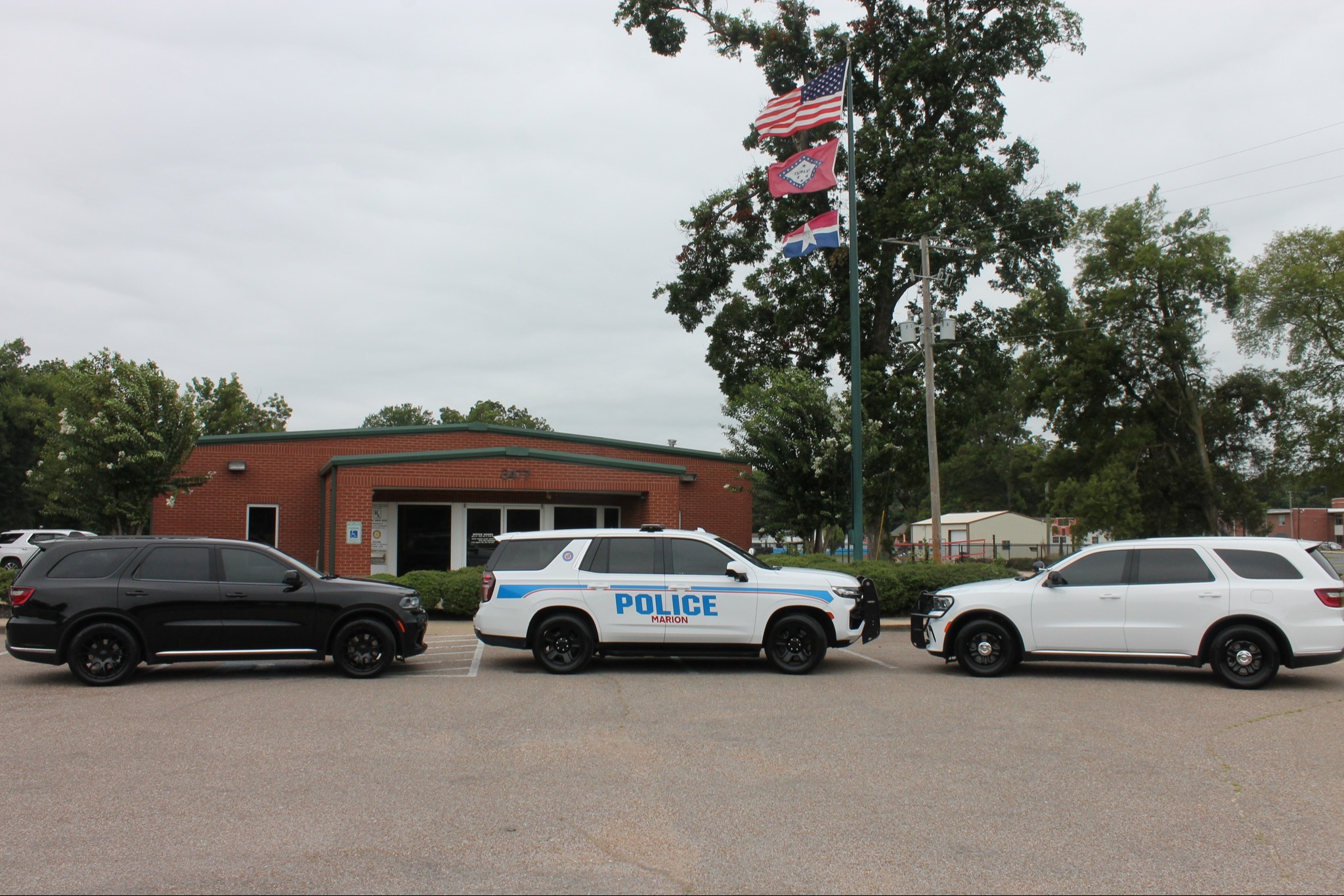 photo of marion police vehicle and office building