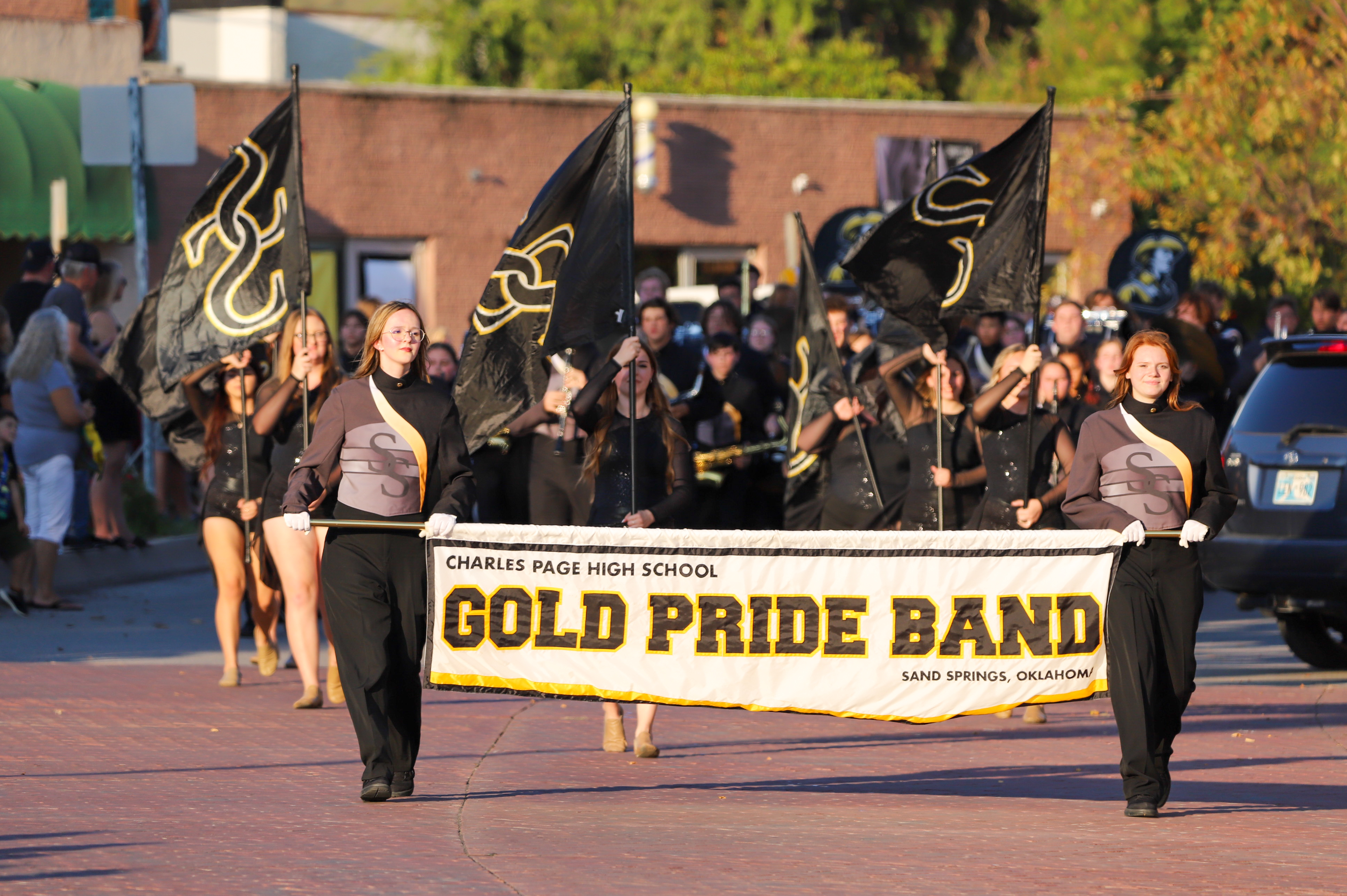 Gold Pride Band leading the homecoming parade