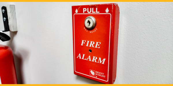 Fire Alarm panel with text "PULL Key Reset Fire Alarm Silent Knight"