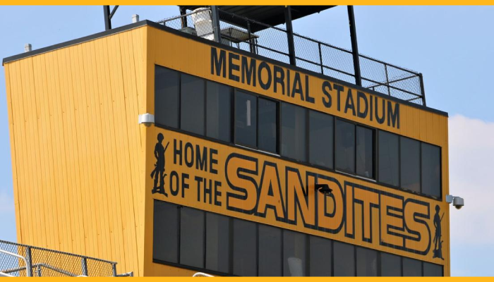 Press box at Memorial Stadium with text reading "Memorial Stadium Home of the Sandites"