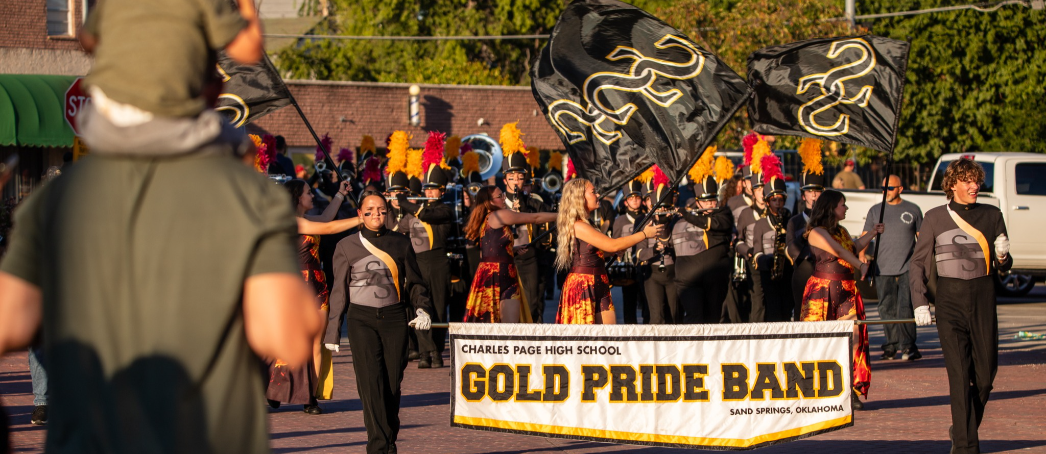 Gold Pride Band leading the homecoming parade