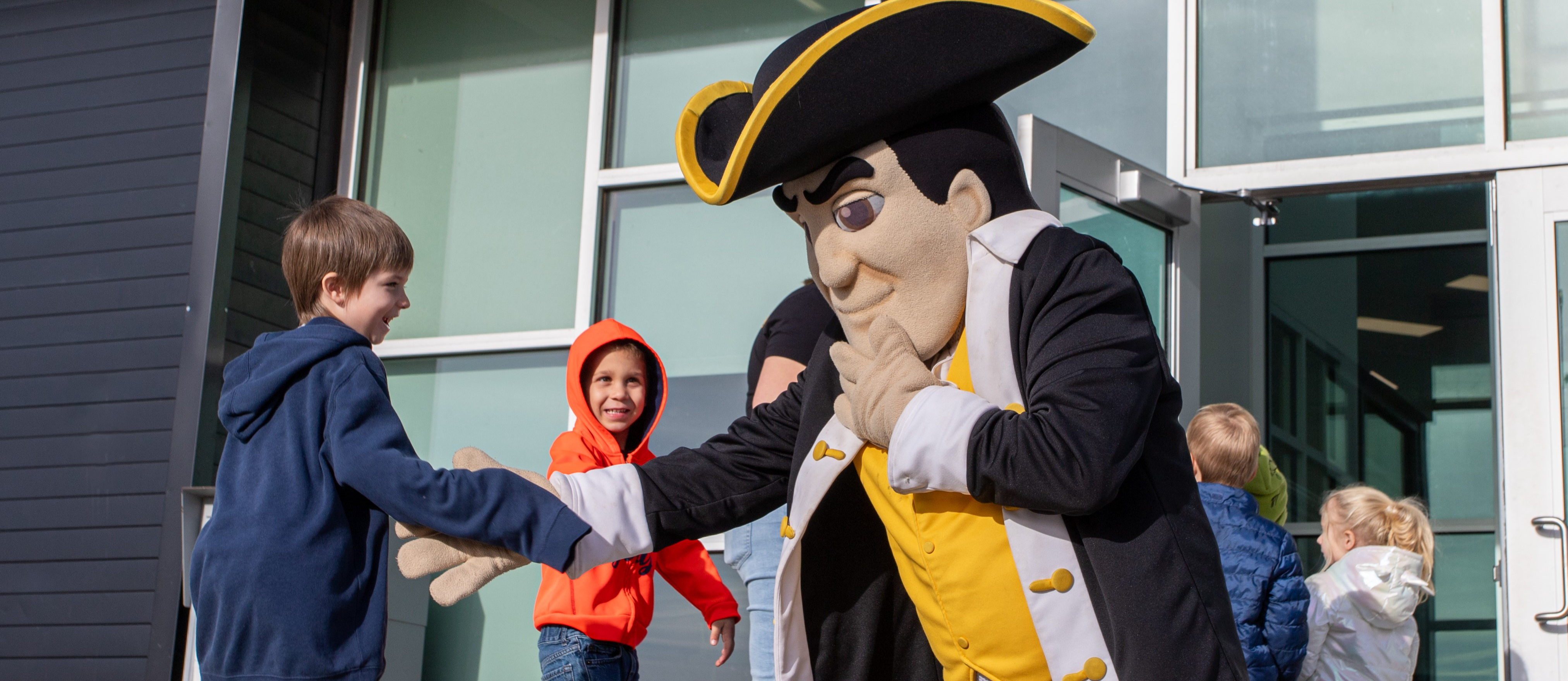 Pre-k students meet Minuteman mascot