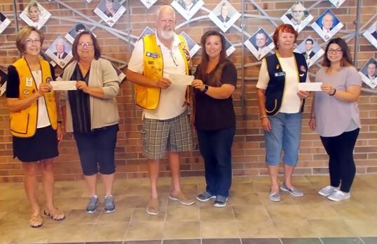 lions club donations with a check