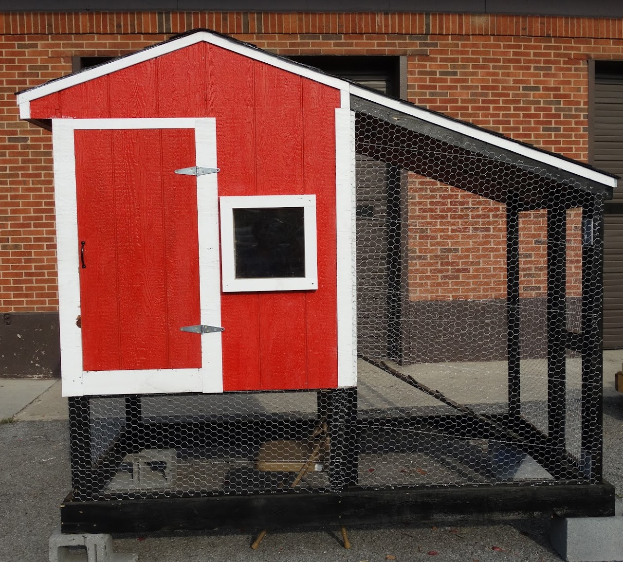 Picture of a red chicken coup