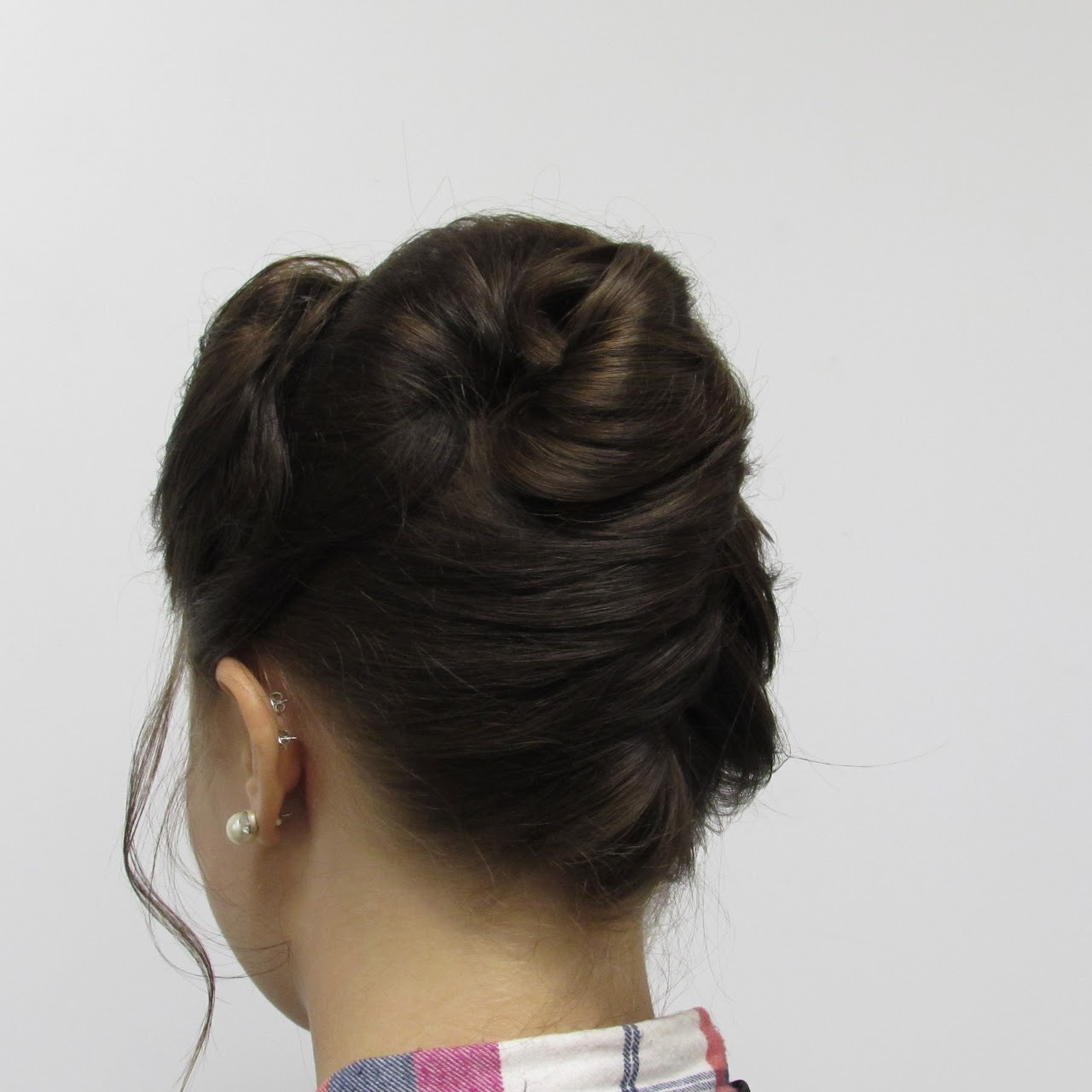 Photo of an updo on a brunnette female