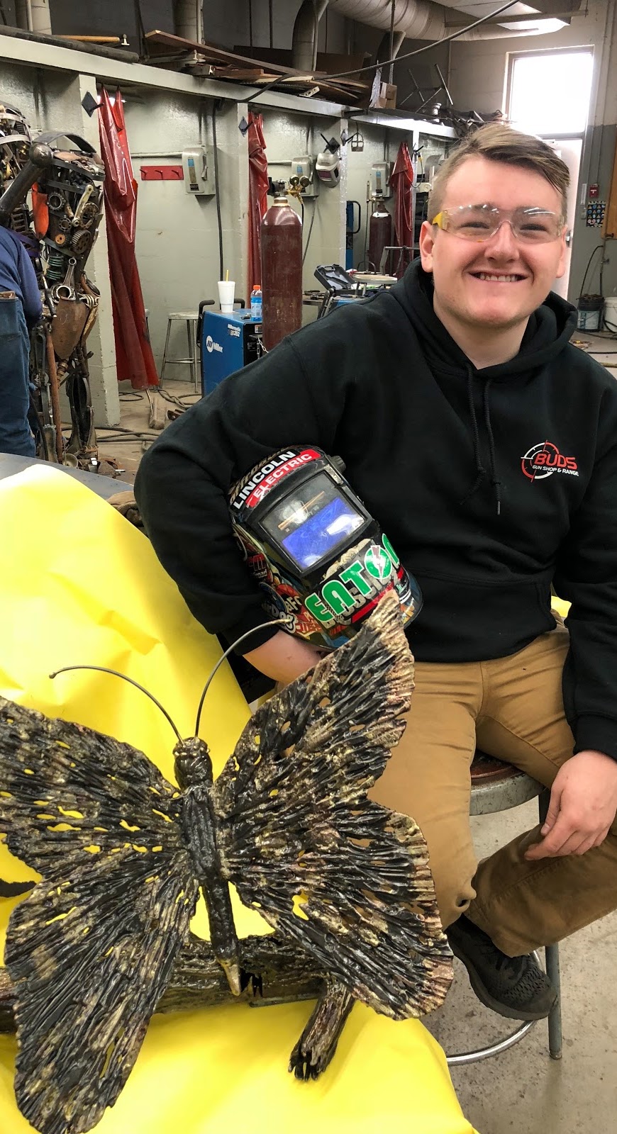 Student with welded butterfly