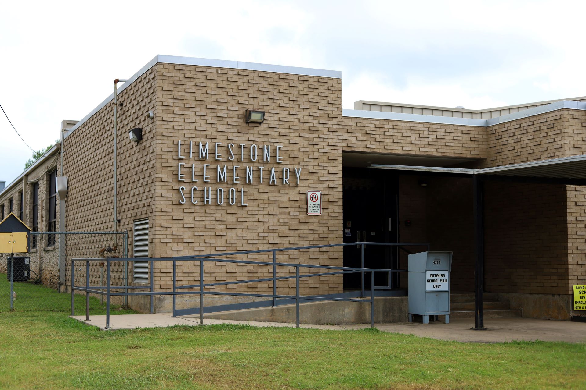 exterior photo of building with text reading Limestone Elementary School