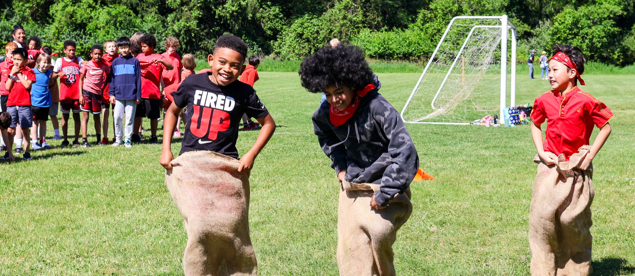 kids compete in a sack race