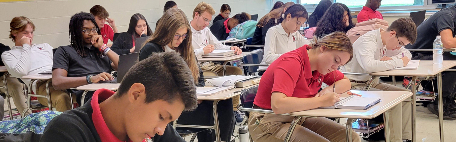 Luers students at their desks, studying intently