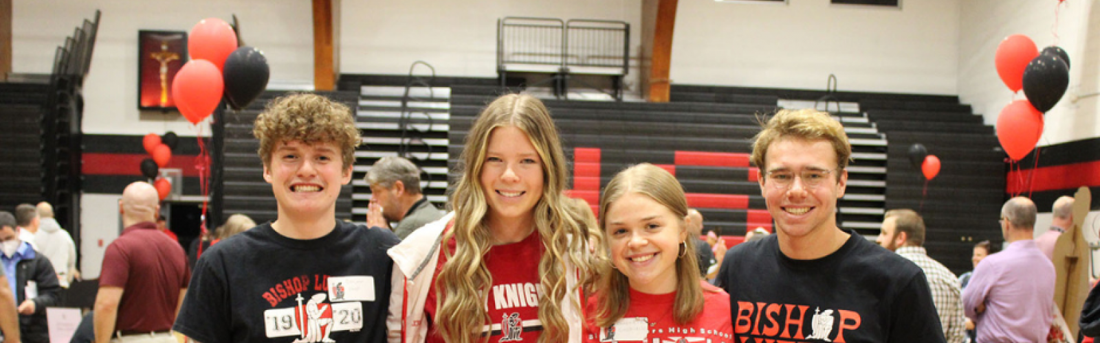 Four Luers FBLA students smiling in the gym