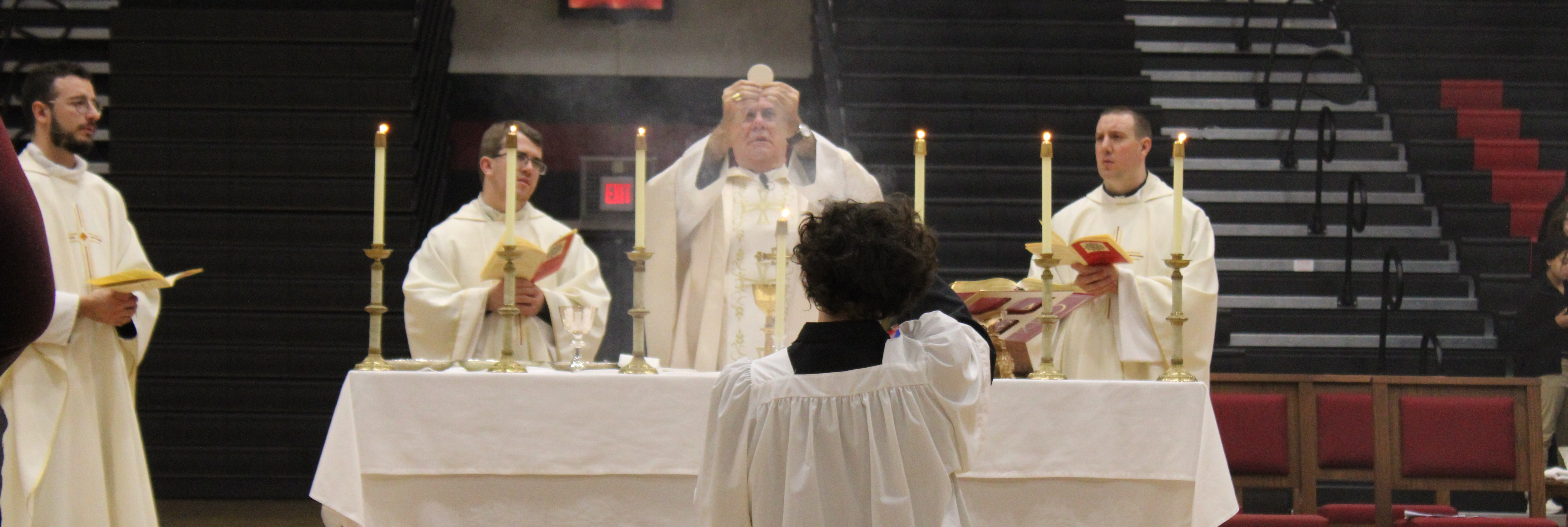 Bishop Holding up Jesus at Mass