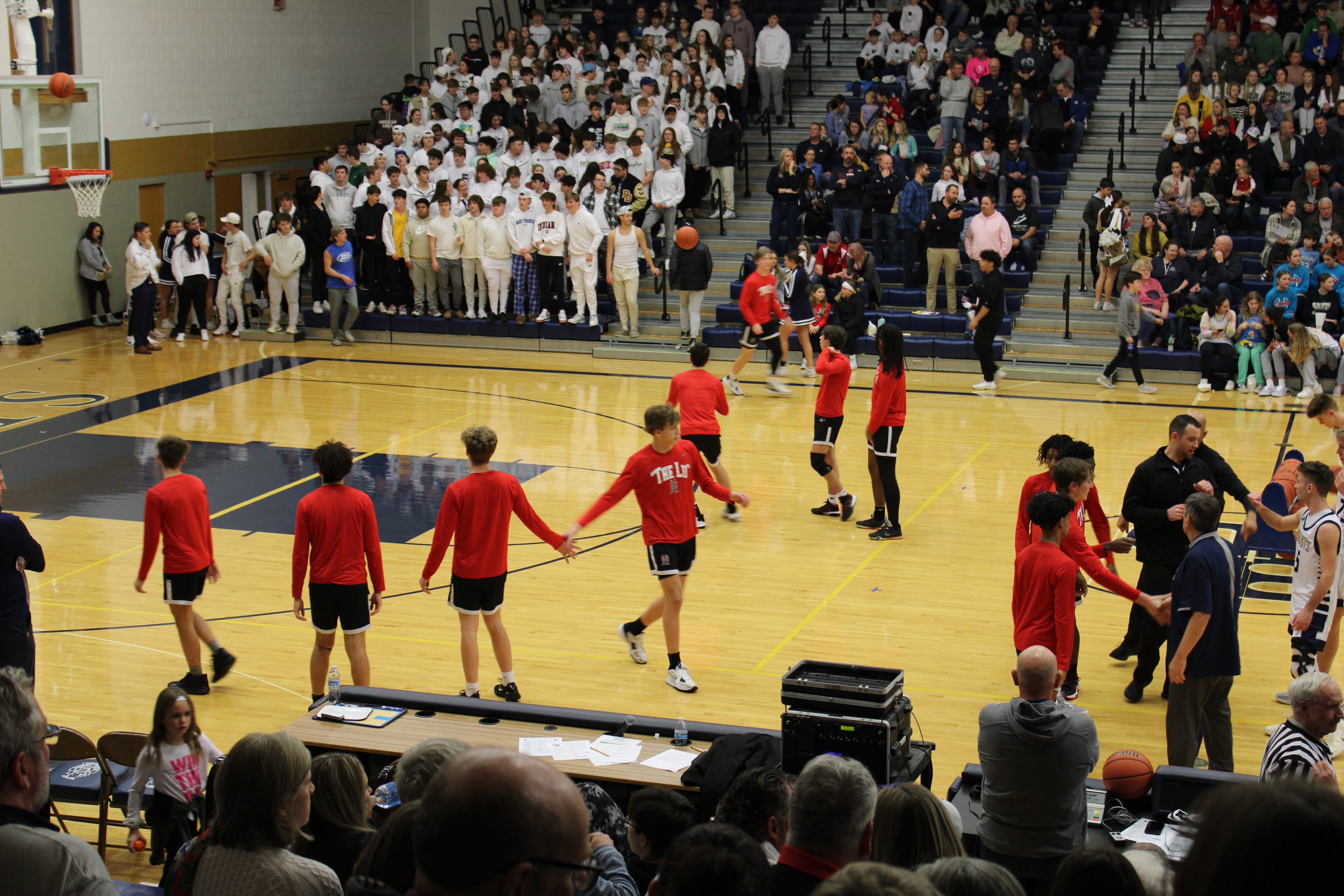 basketball players on court