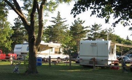 two RV's at a campsite