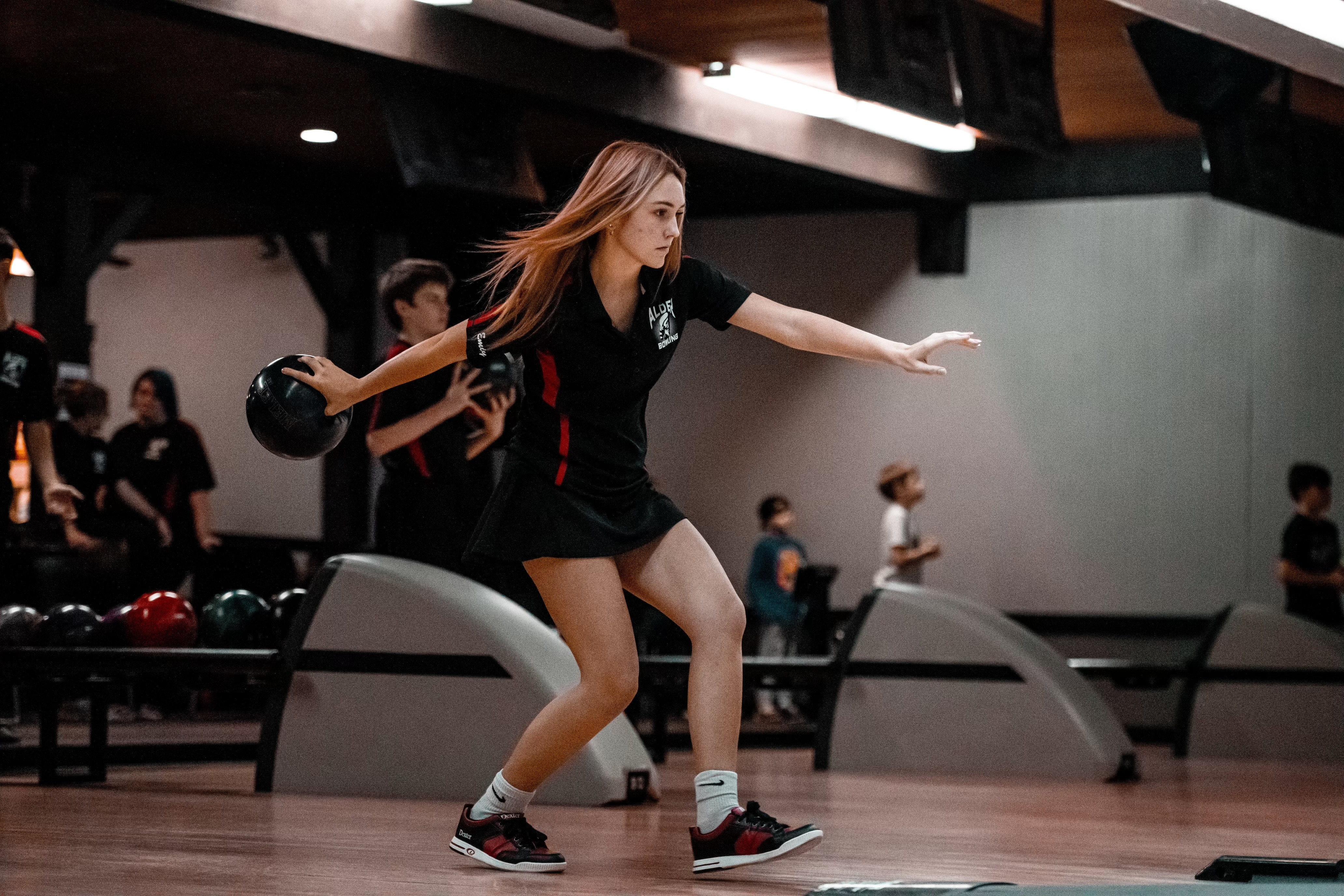 a student prepares to throw the ball
