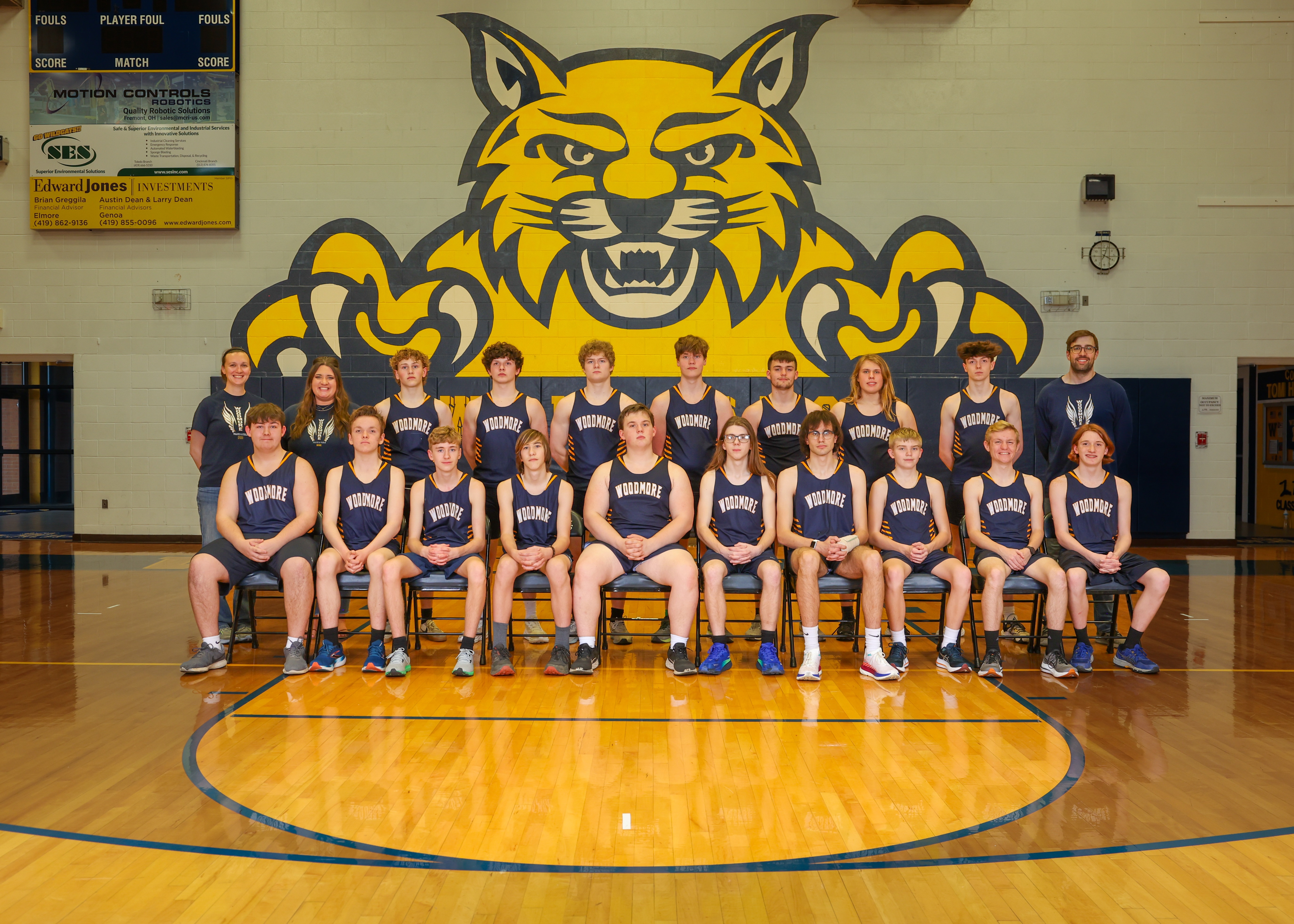 Boys track team photo in the basketball gym