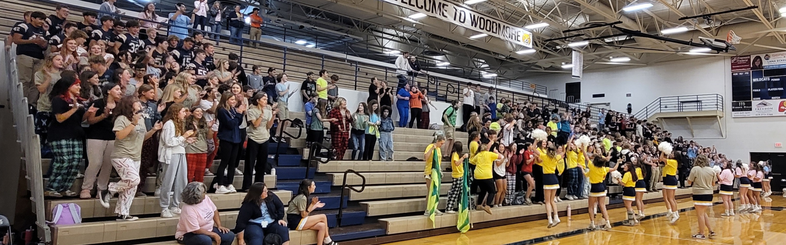 Students cheering at the end of the pep rally