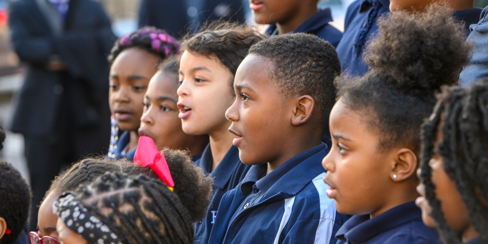 Group of kids wearing uniform close up