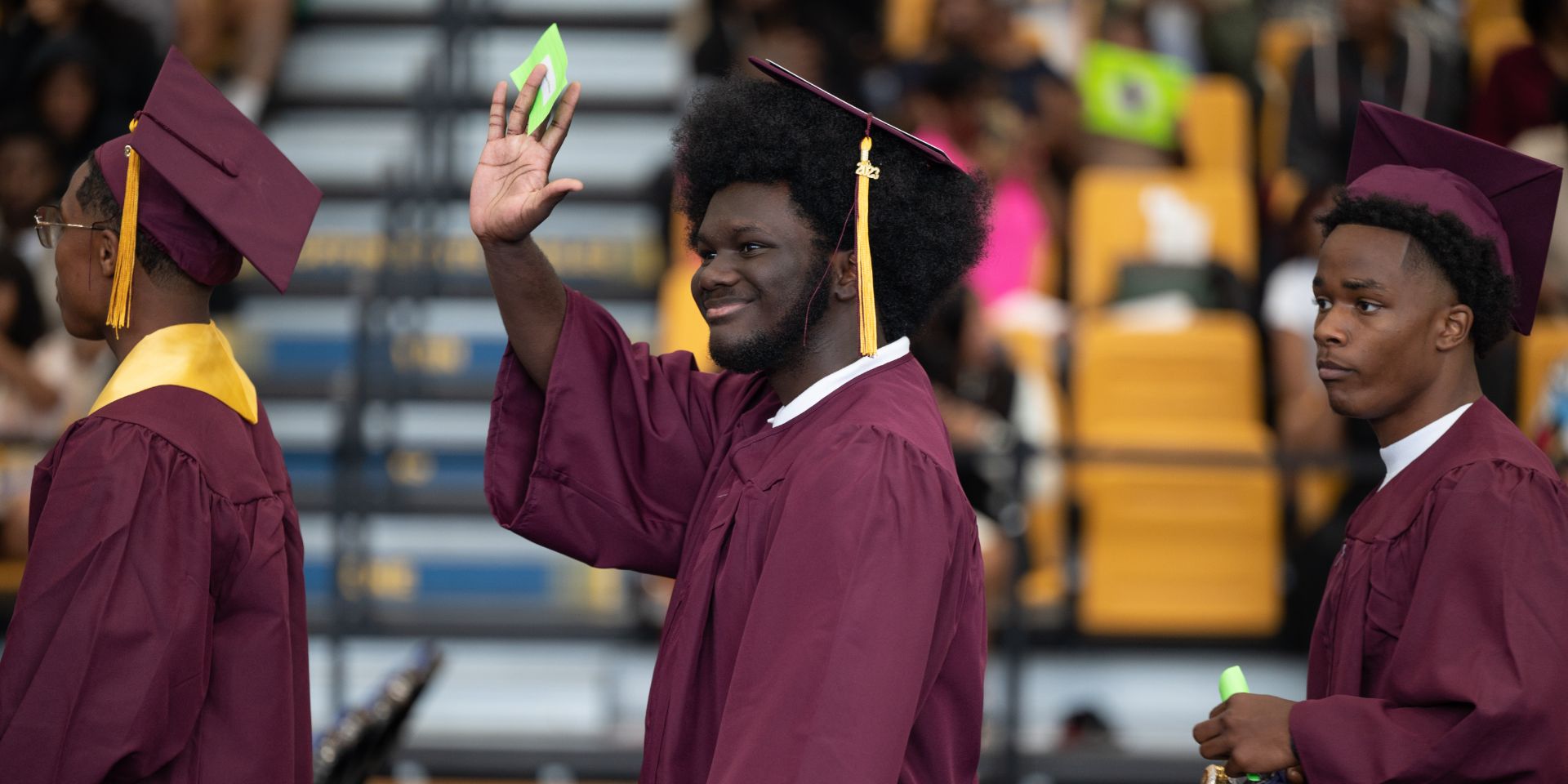 Graduate saluting 