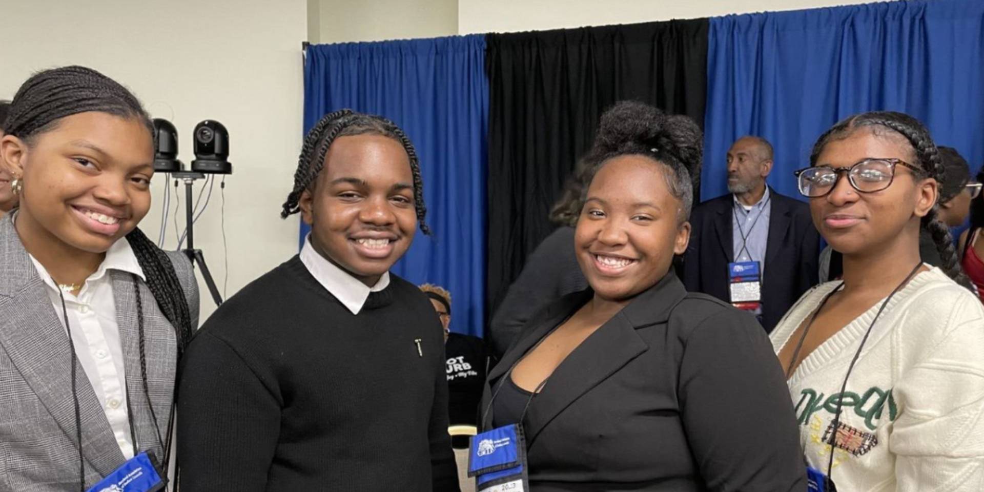 Three Students Smiling 