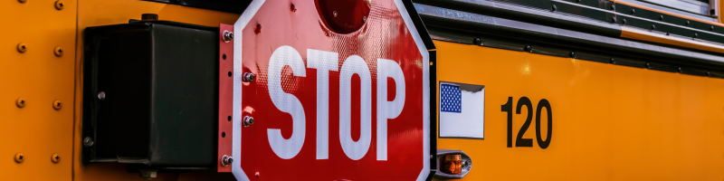 school bus with stop sign