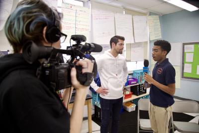 Media Team doing an interview to a teacher