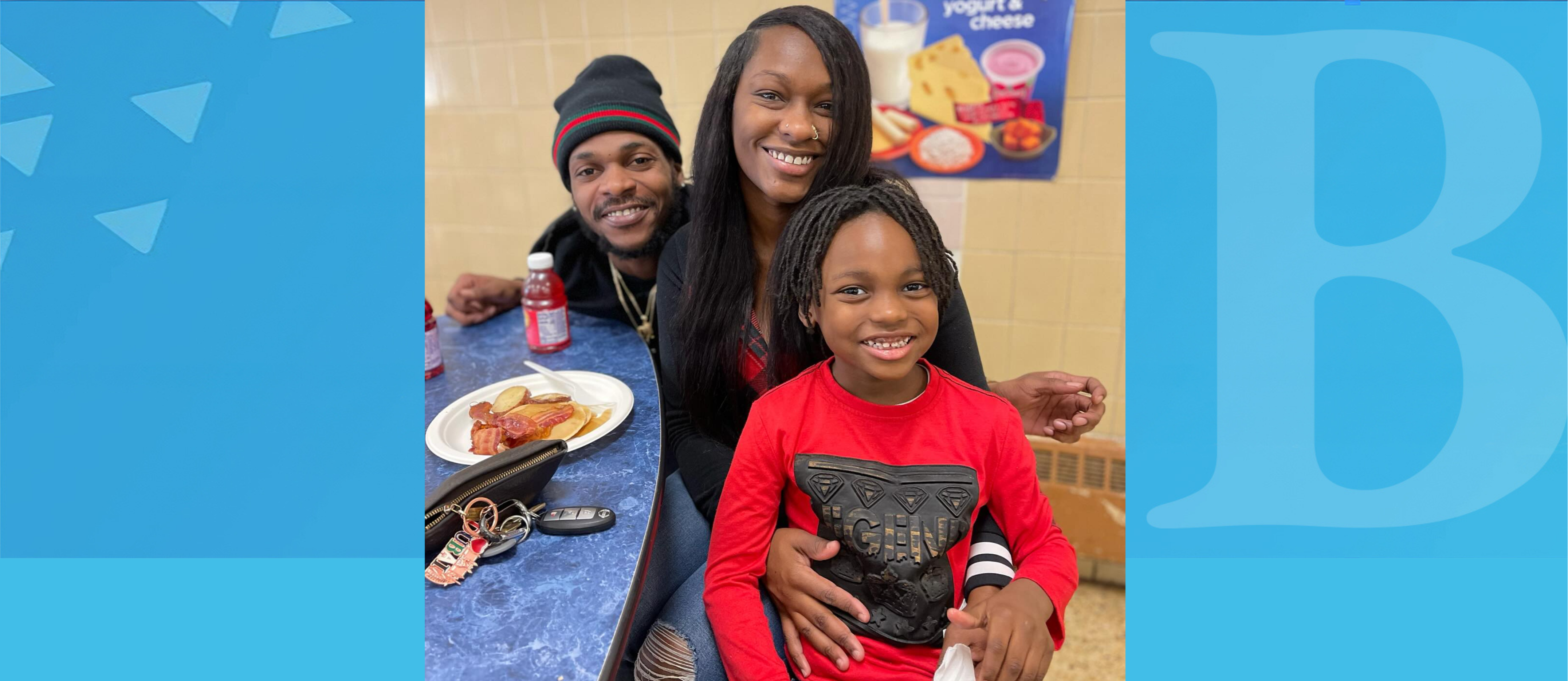 Student has lunch with his parents at school