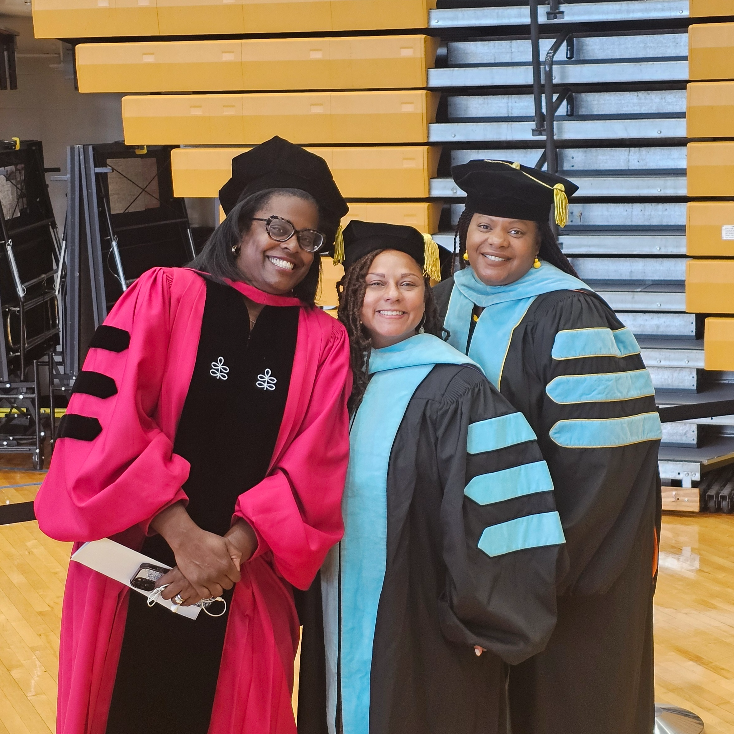 CEO poses with other members of cabinet at 2024 Summer Graduation