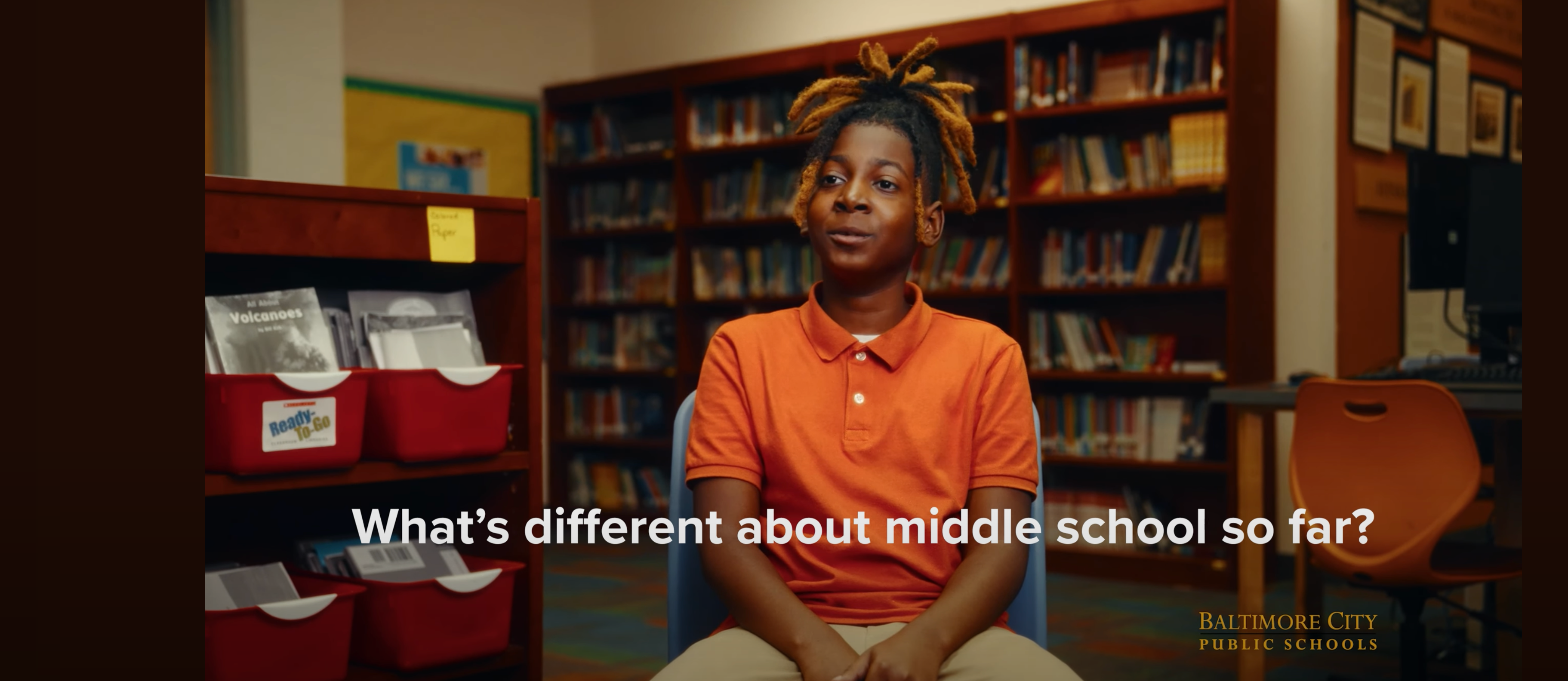 Sixth grader being interviewed in library