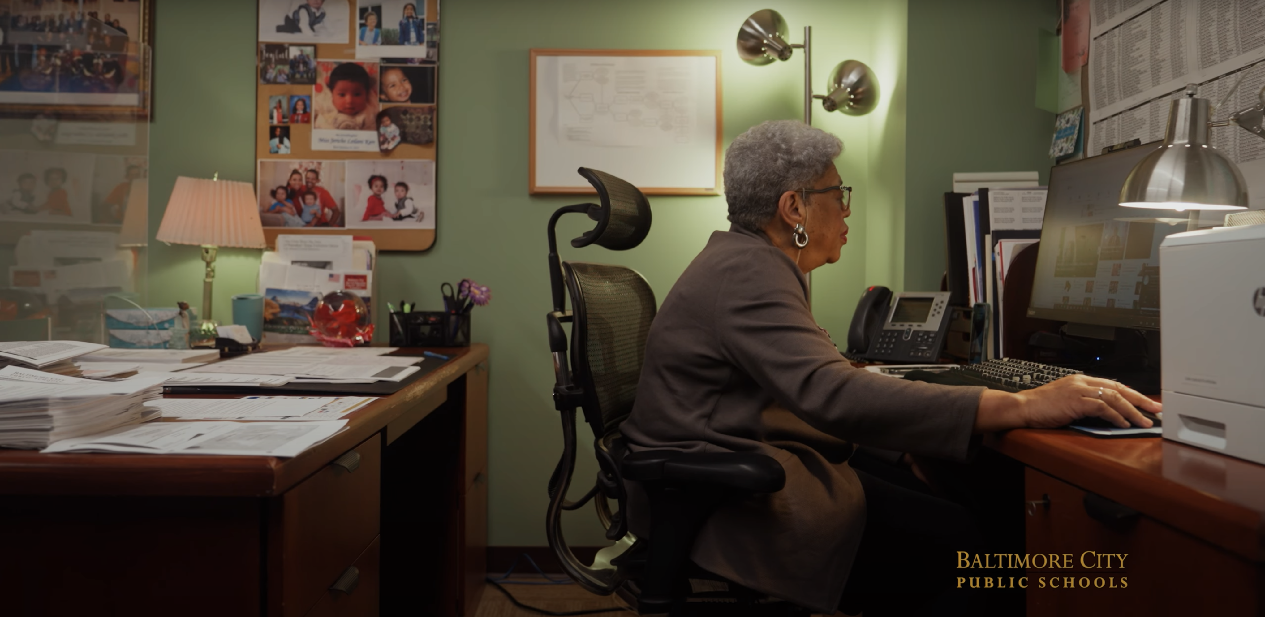 CEO Ombudsman Karen Lawrence works in her office desk. 