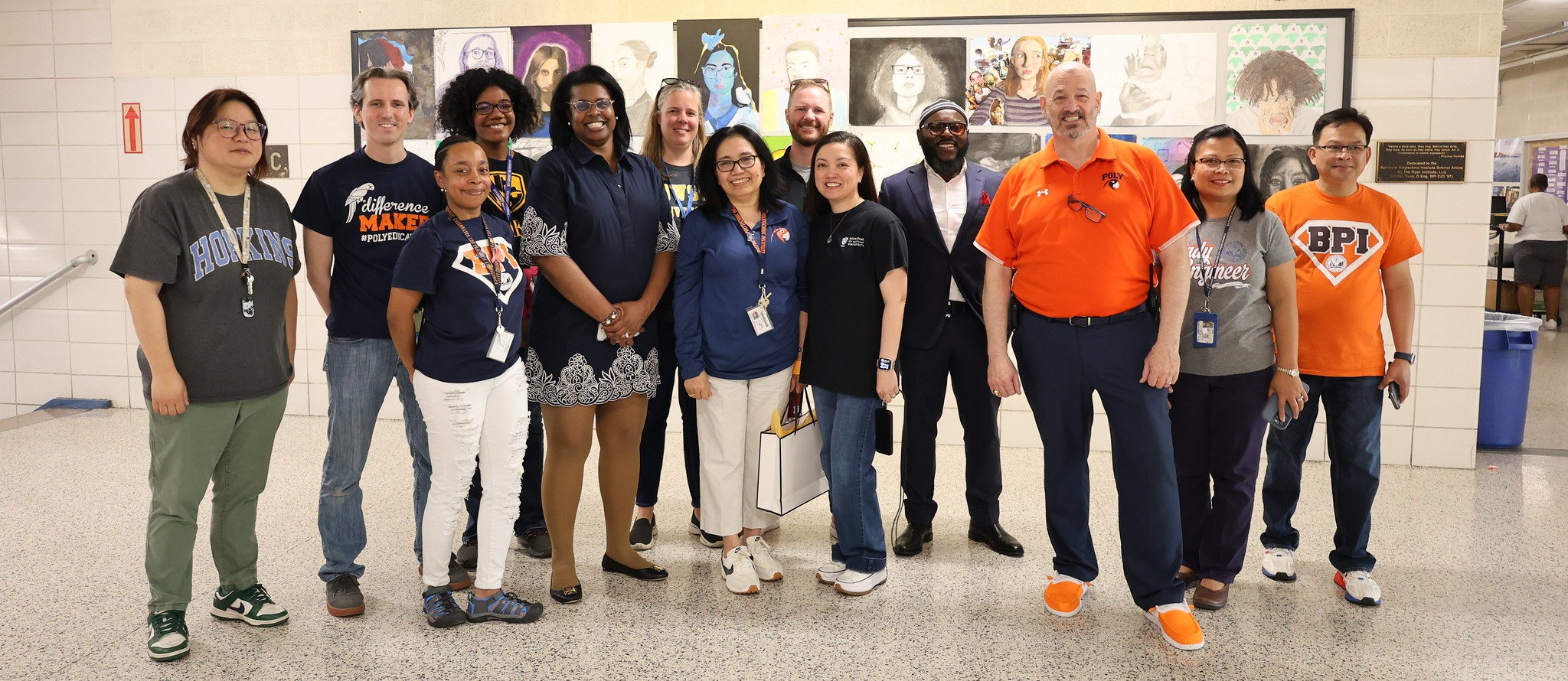 Dr. Sonja Santelises visits Poly to award a teacher for their outstanding service. 