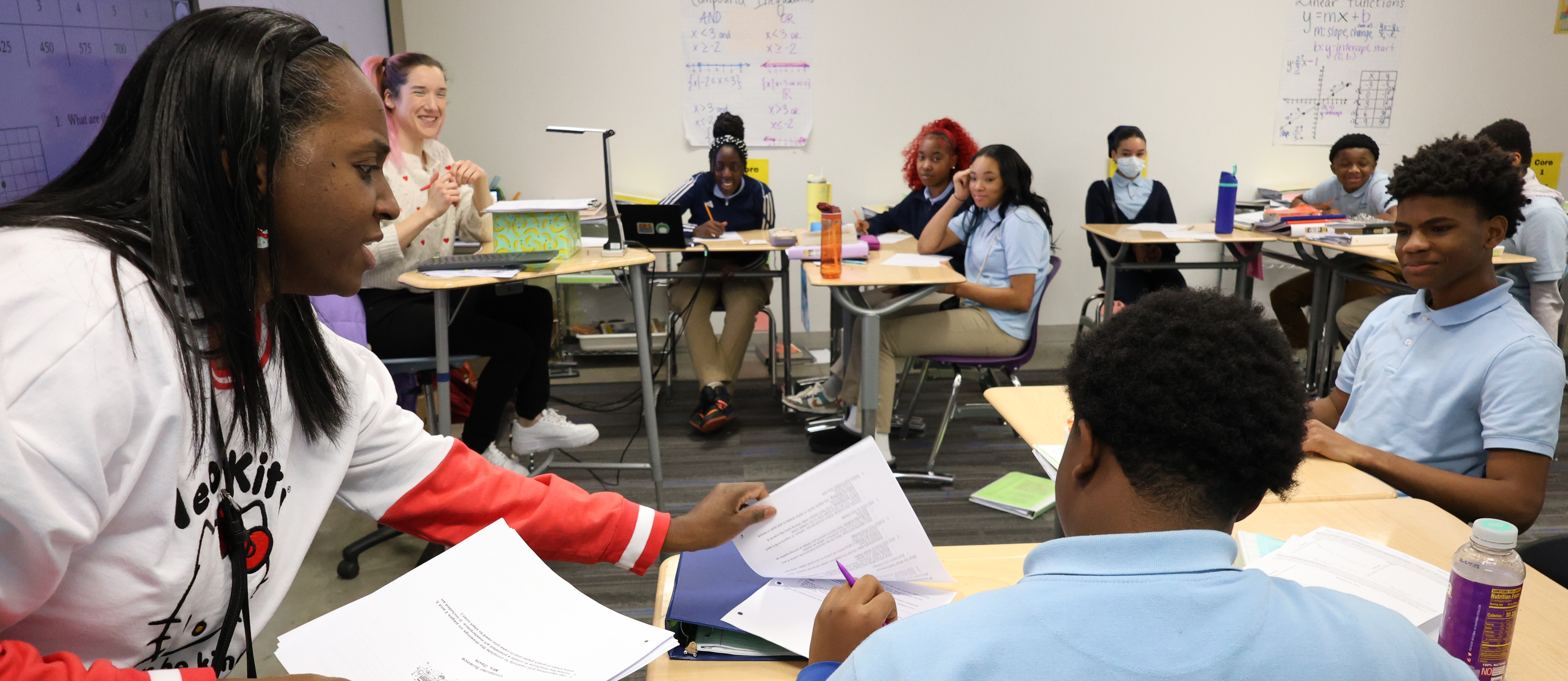 Ms. McCauley instructs her 8th-grade math class. 