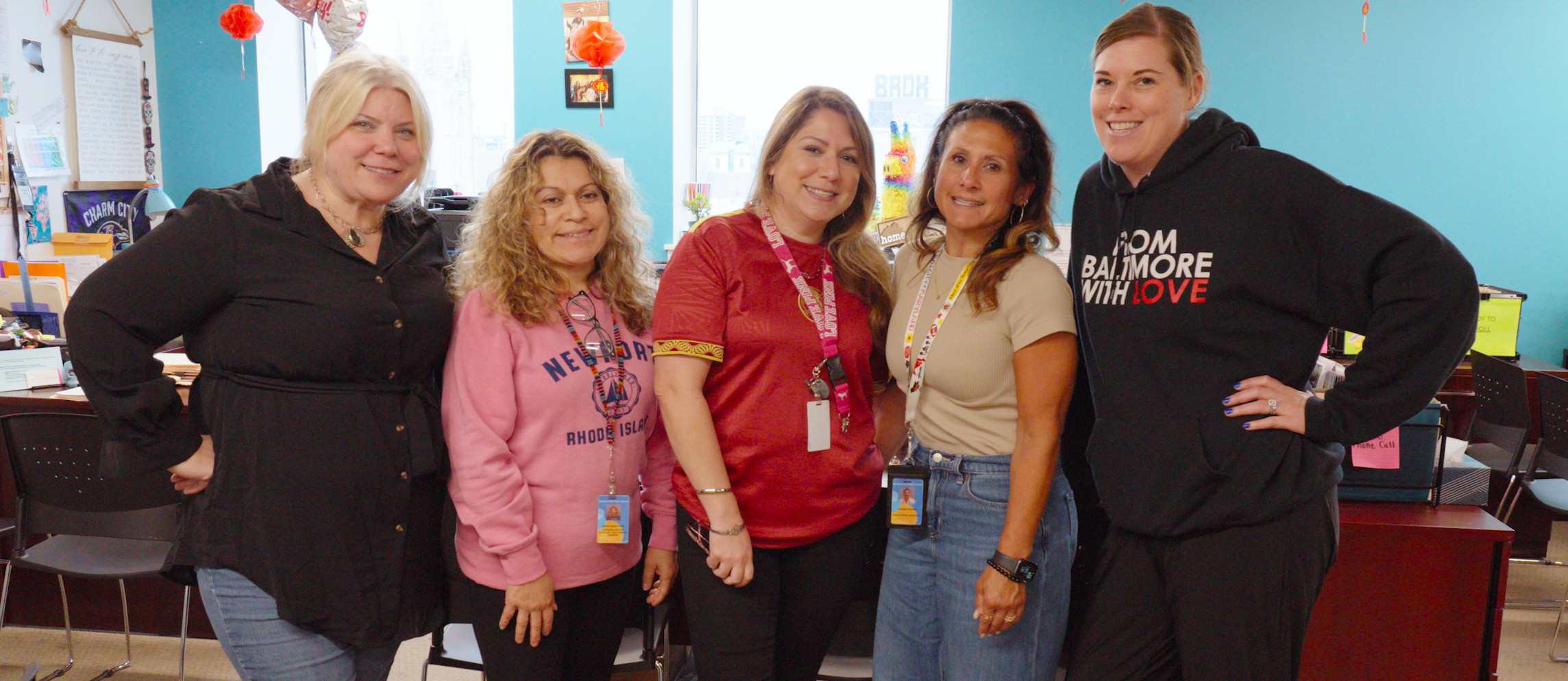 Staff poses for a group picture on the first day of school