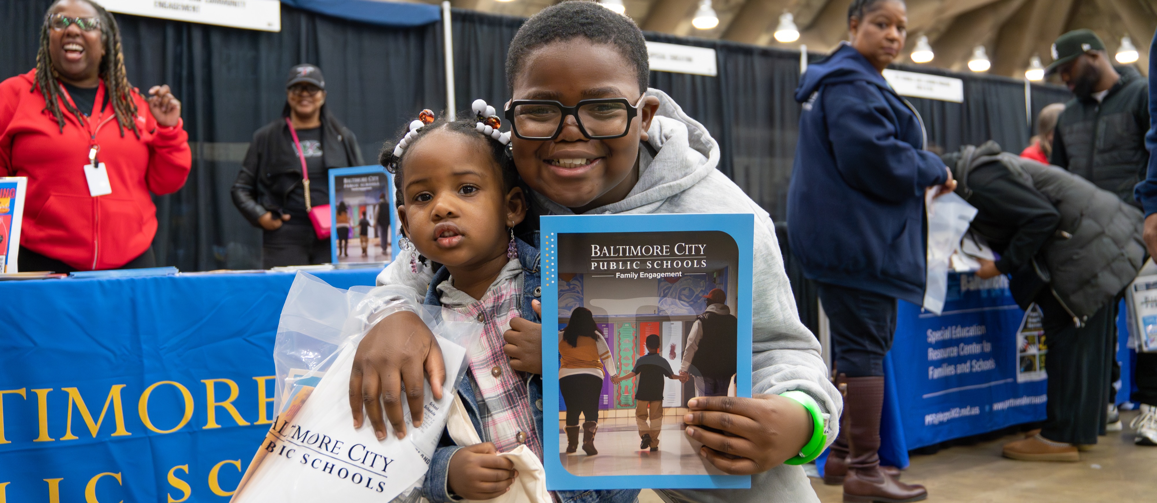 Student siblings pose for a photo at the Annual Choice Fair