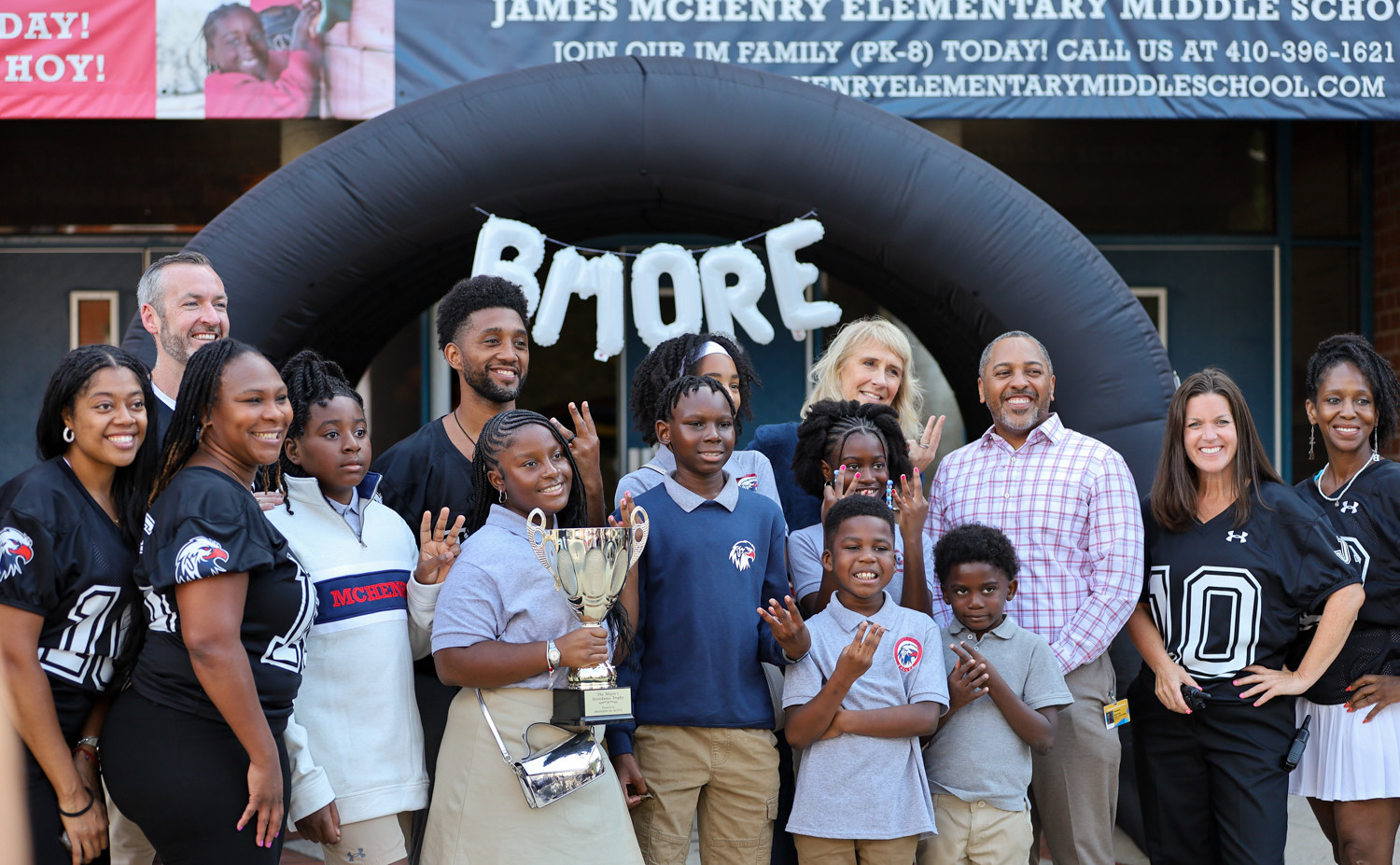 James McHenry EMS receives the attendance award for the 3rd time in a row. Students pose for a picture with the Mayor of Baltimore