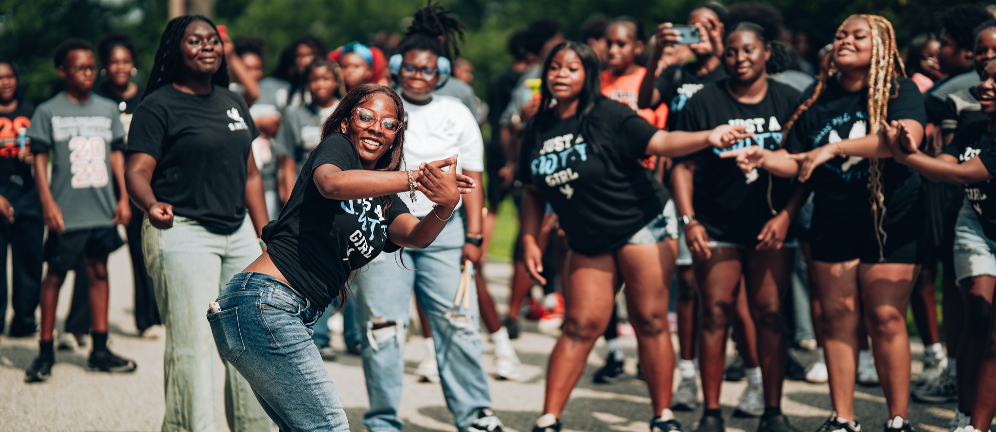 City College students performing outside during freshmen welcome event