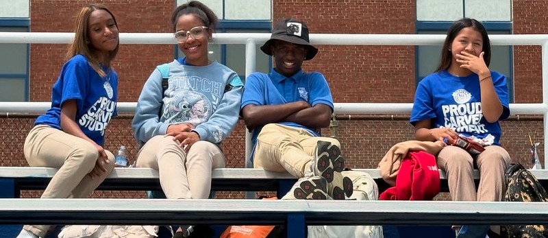 City College students performing outside during freshmen welcome event
