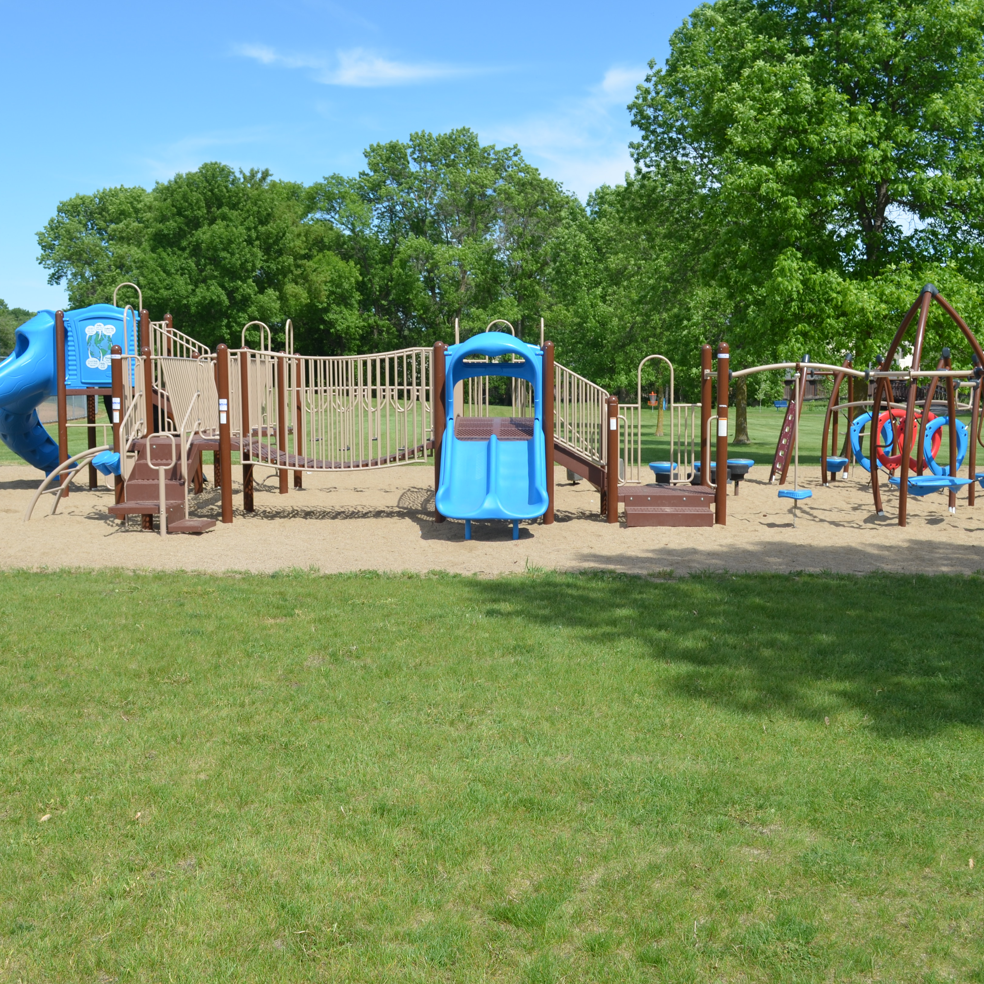 a playground with blue slides 