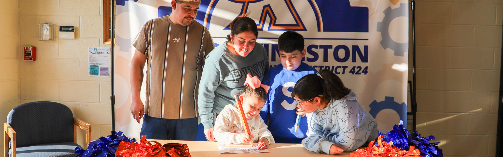 image of future cog and family during signing day