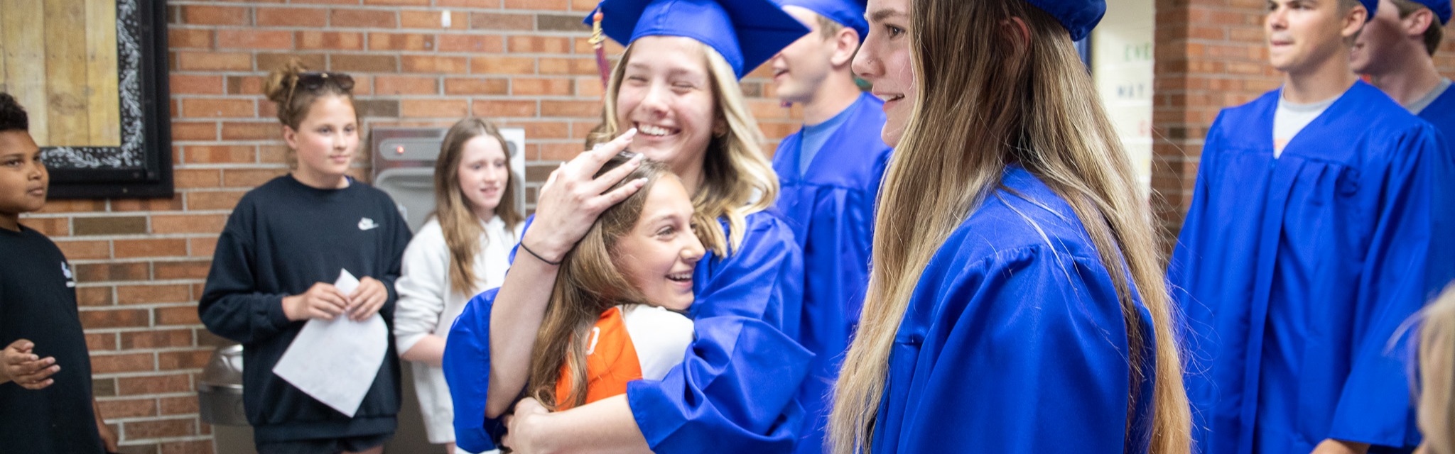 students at graduates on parade