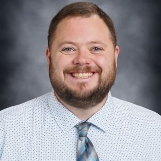 Addison Czeck, Middle School Principal with wife and three children (two daughter, one son)