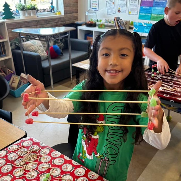 Kid playing with crafts