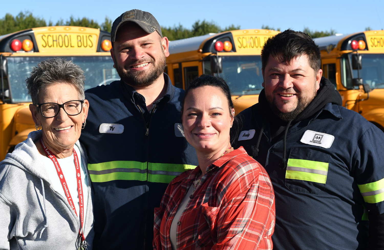 Transportation staff smiling at camera