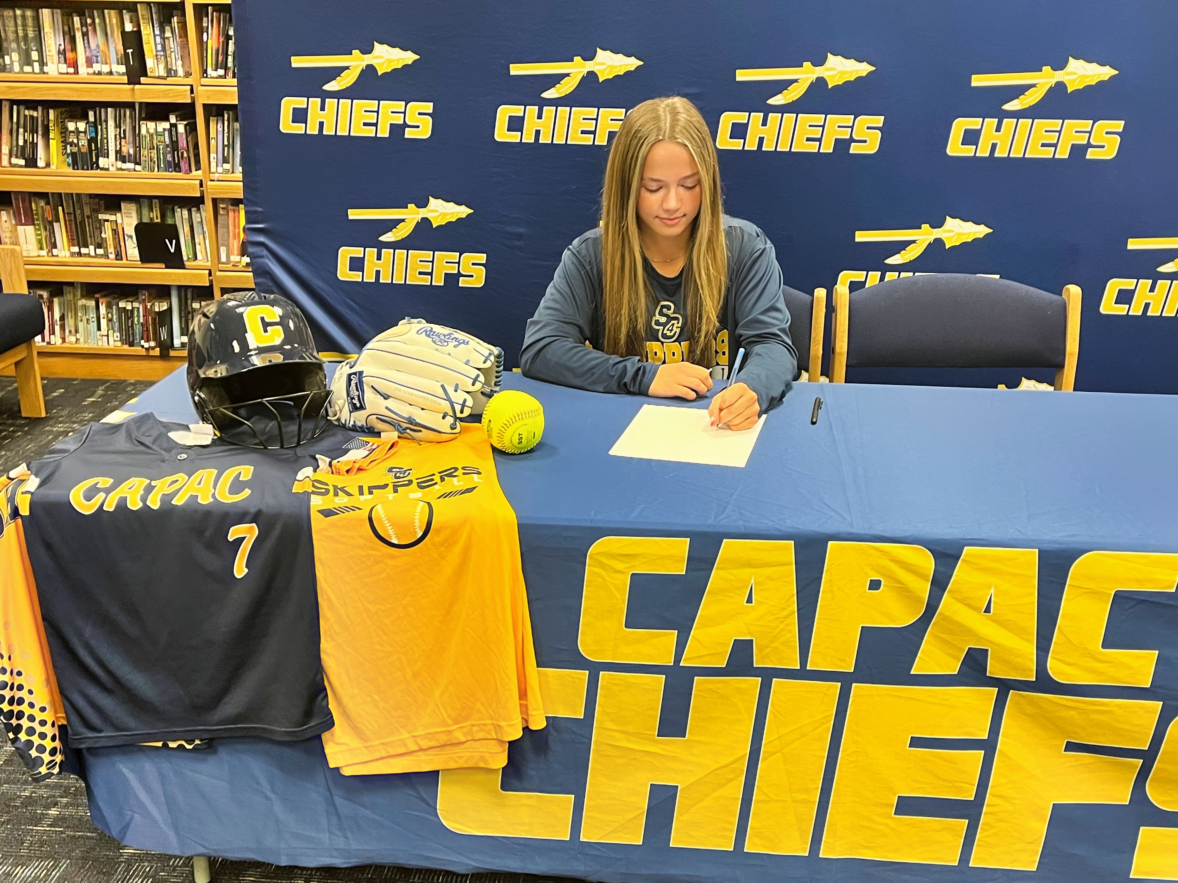 photo of Annabelle Schneider signing for  SC4  Softball