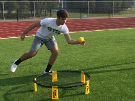 A student playing Spikeball