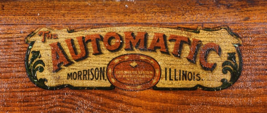 image of wood etched with automatic Morrison Illinois symbol