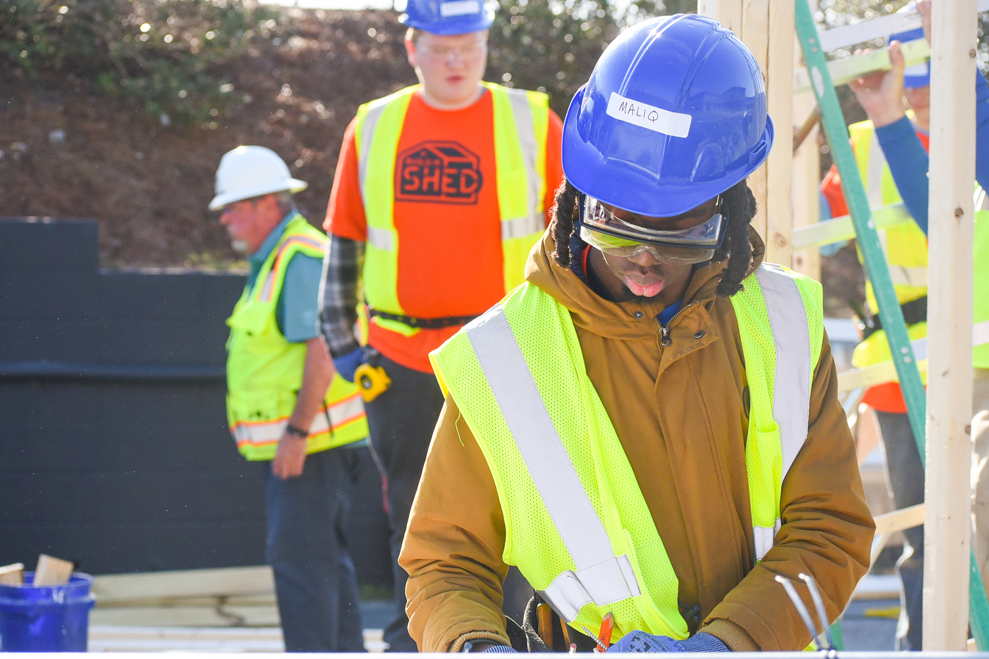 students building shed